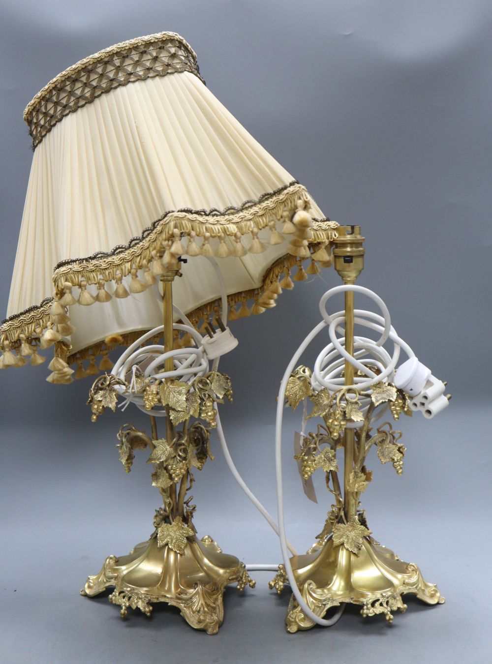 A pair of gilt metal grapevine table lamps